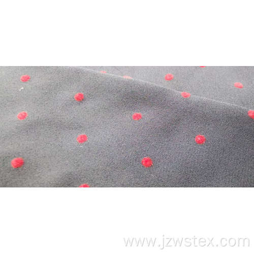 100% Polyester moss crepe with Red flocking